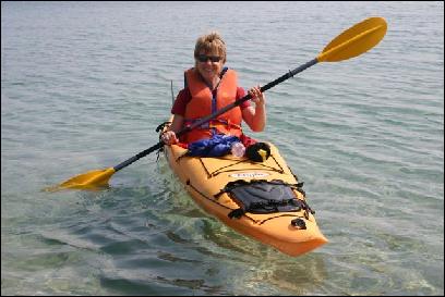 Kayaker on the beach